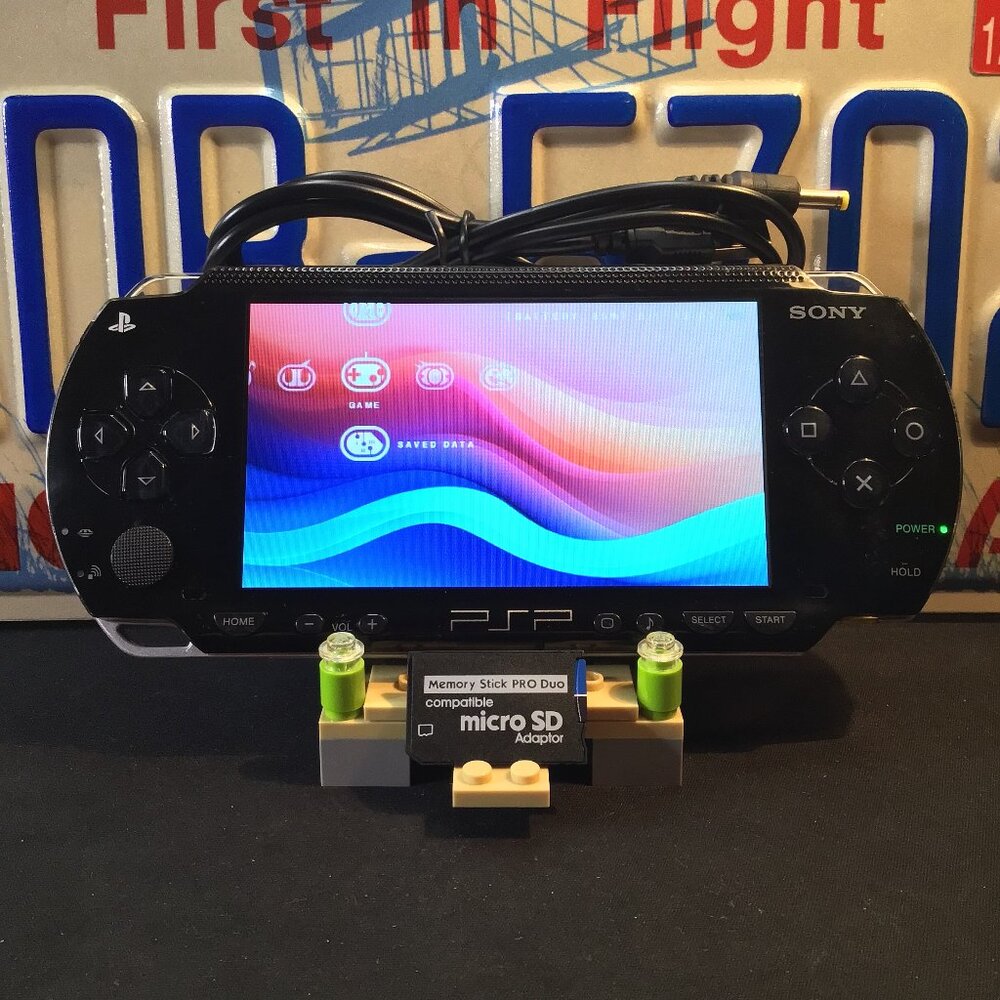 Sony PSP 1001 with Charger & Games Installed on 64GB Memory Stick